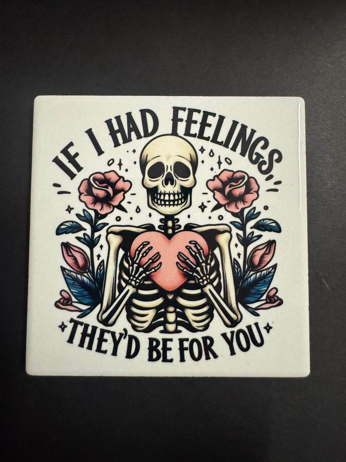 Skeleton holding heart with roses dark humor coaster