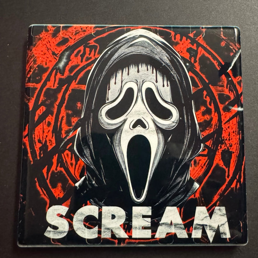 Square ceramic horror coaster featuring a hooded white scream mask on a red and black background