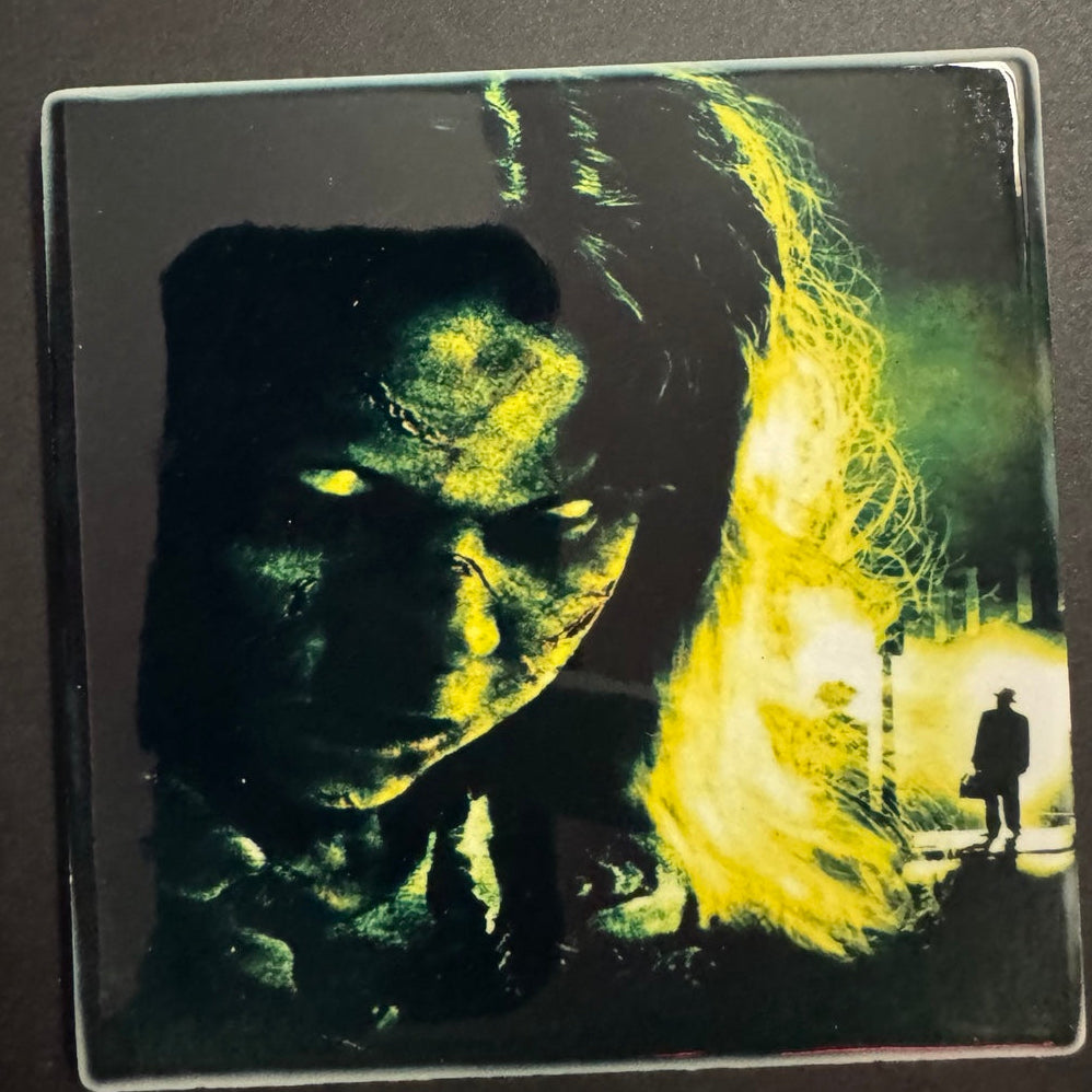 Classic supernatural horror inspired green and black coaster