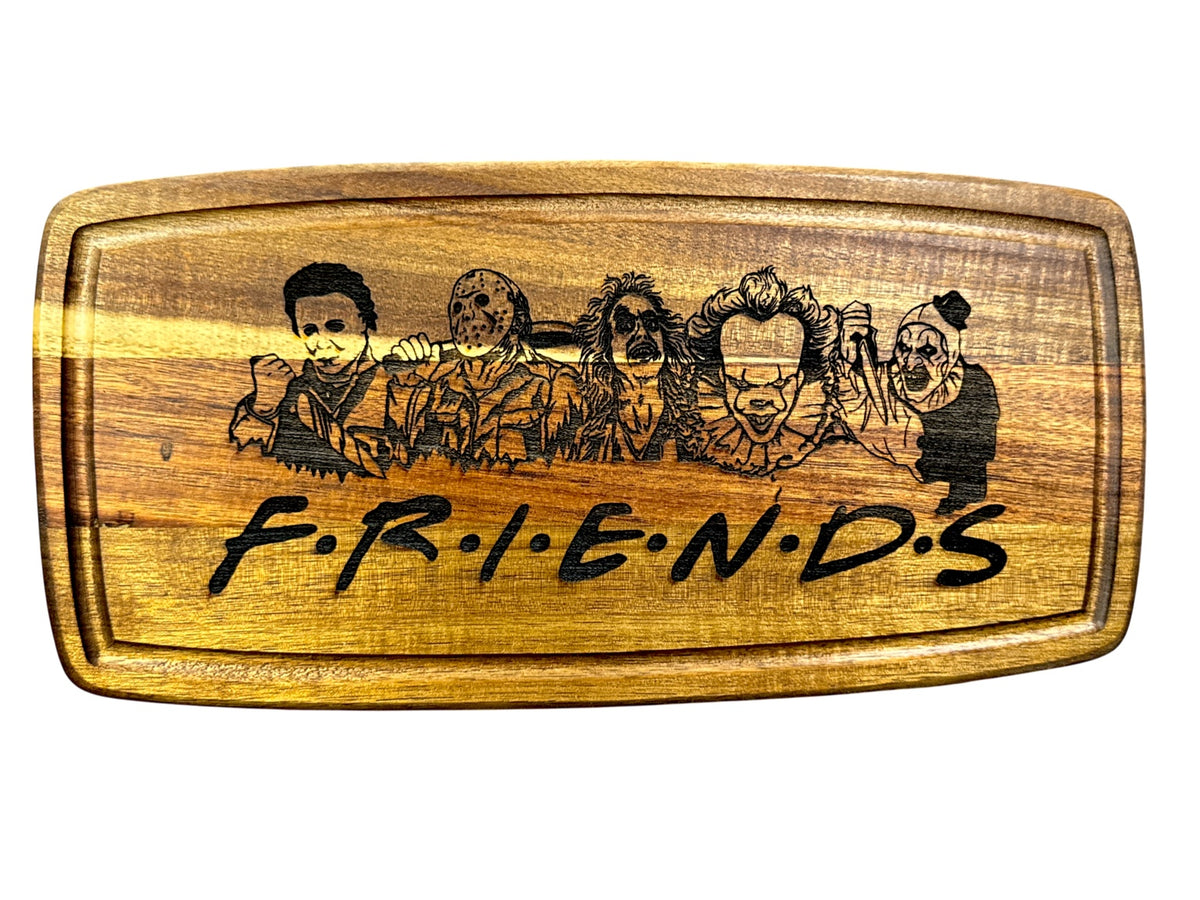 Horror Friends laser engraved acacia cutting board with horror characters