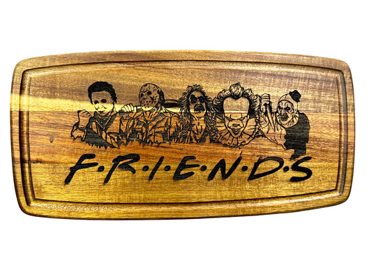 Horror Friends laser engraved acacia cutting board with horror characters
