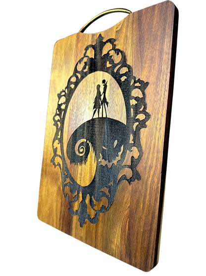 Side view of Jack and Sally laser engraved acacia cutting board