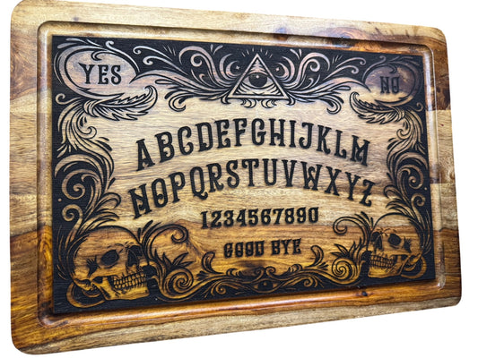 Angled view of engraved acacia Ouija inspired spirit board