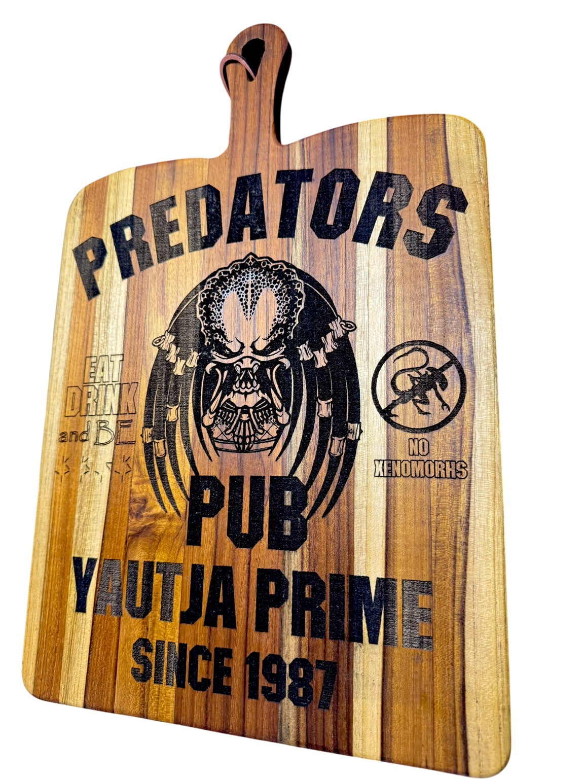 Angled view of Predators Pub Yautja Prime engraved serving board