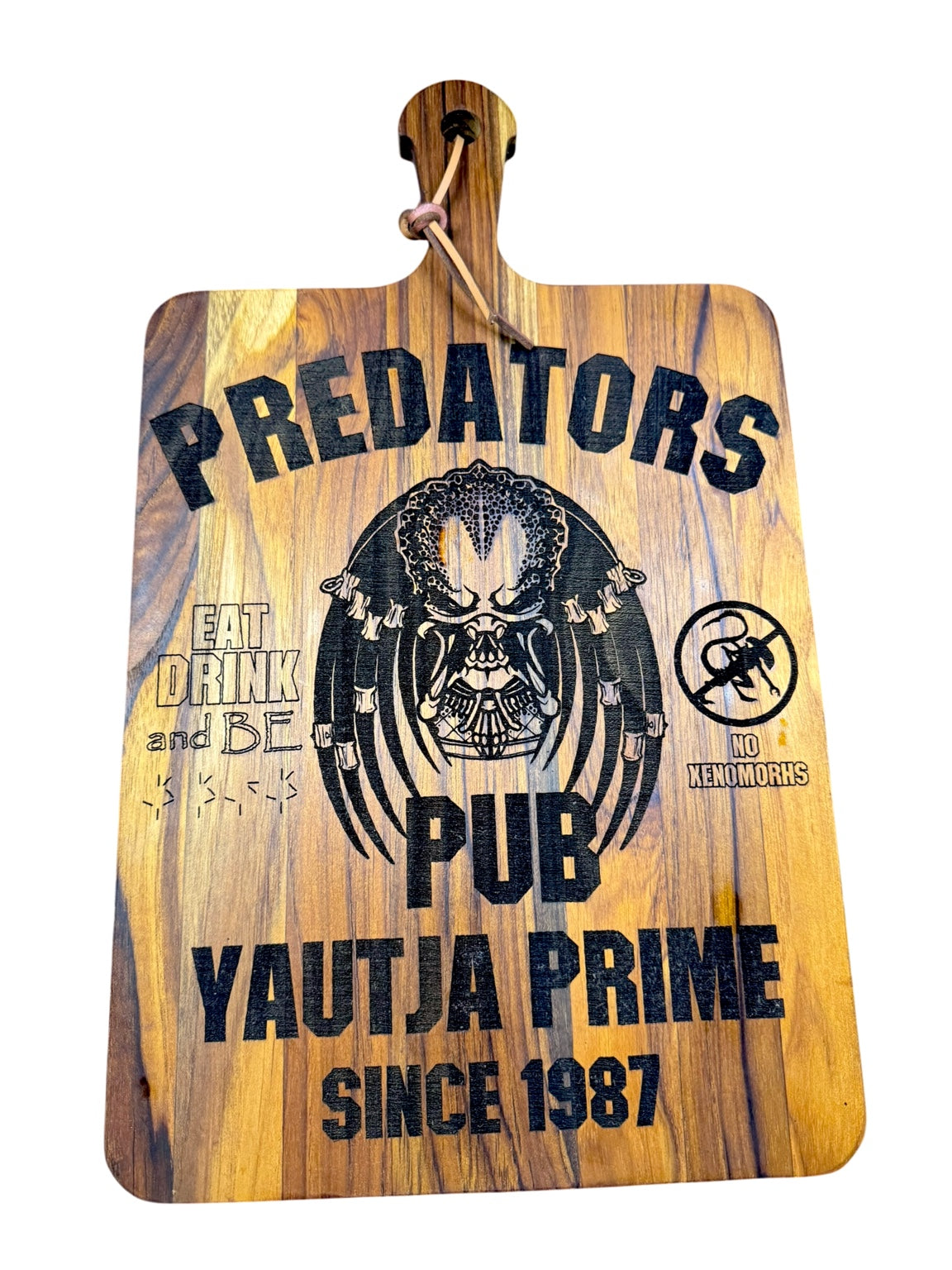 Full view of Predators Pub Yautja Prime laser engraved wood board with handle