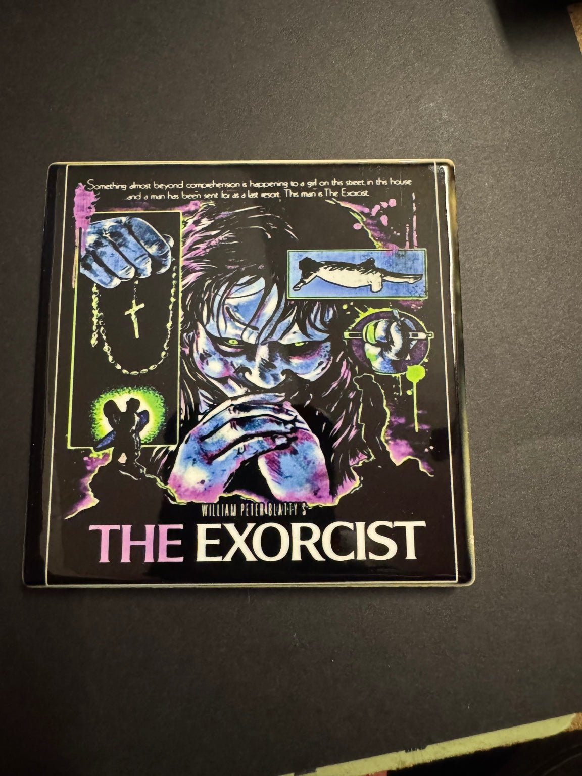 Square ceramic horror coaster featuring a colorful retro supernatural possession movie poster design