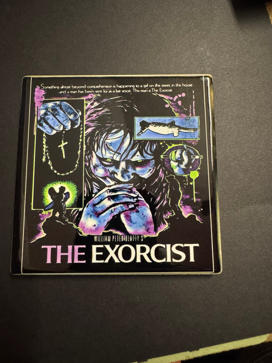 Square ceramic horror coaster featuring a colorful retro supernatural possession movie poster design