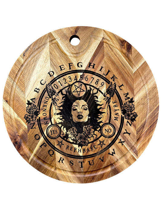Occult spirit board design engraved on round acacia cutting board